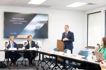 Chief Justice Funke addresses the group